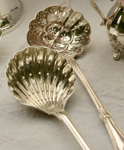 antique silver sifting spoons details